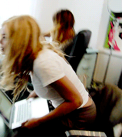 bey sit with laptop
